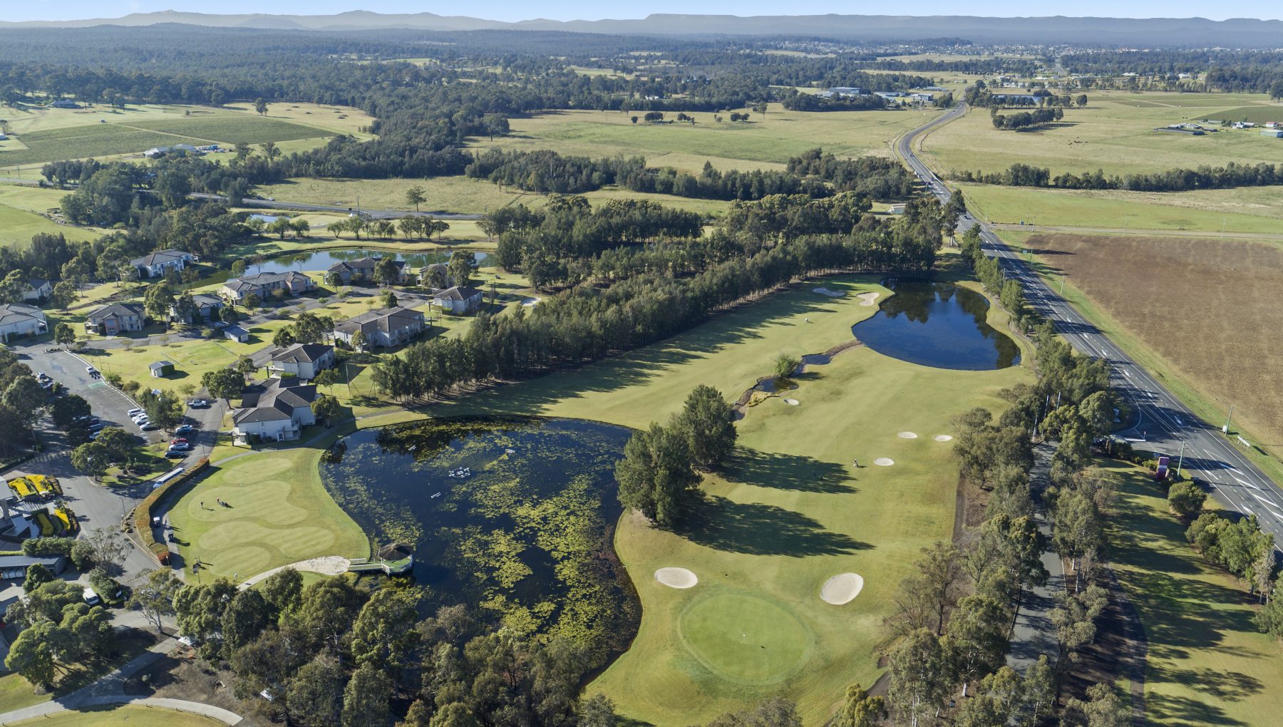 Scenic view of our 71-par golf course featuring picturesque ponds.