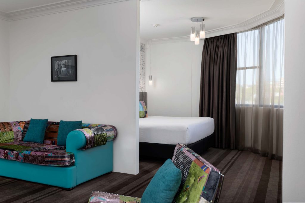Rydges Sydney Central - Executives Suites - Bedroom and Living Room